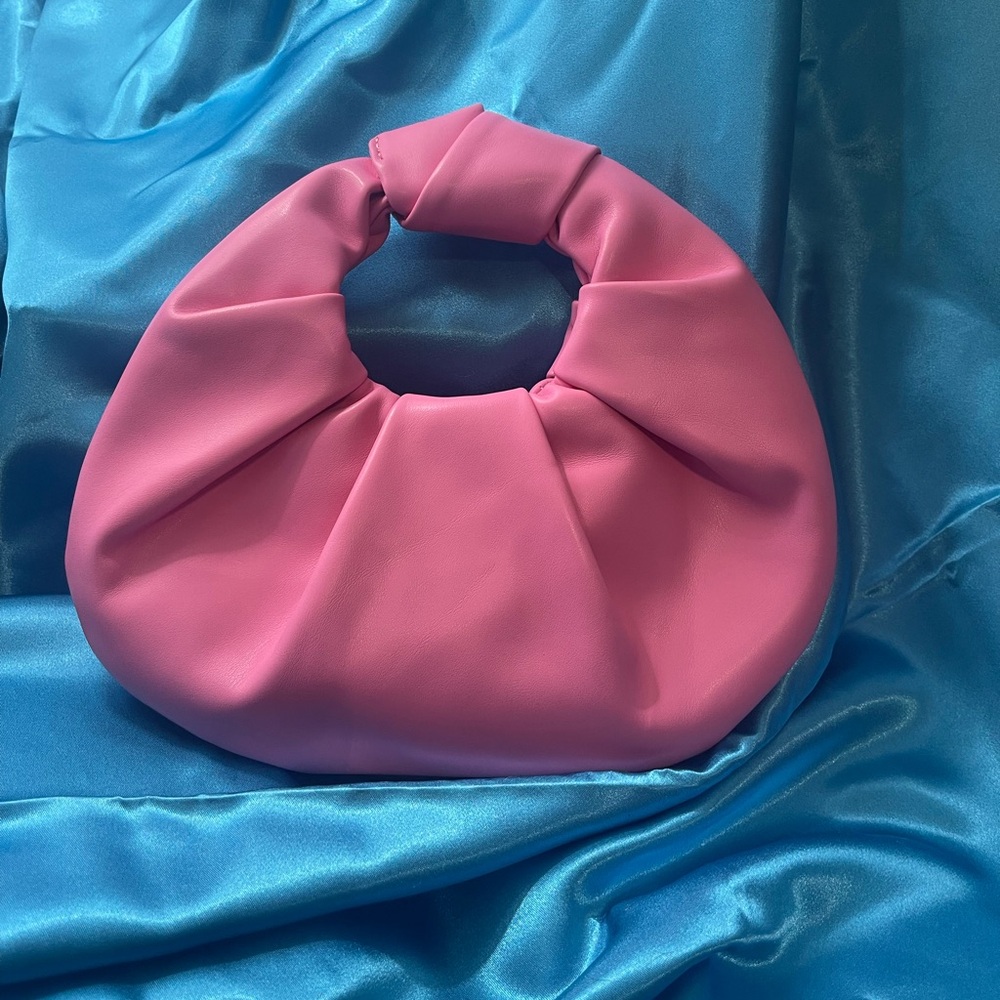Pink knotted handbag
